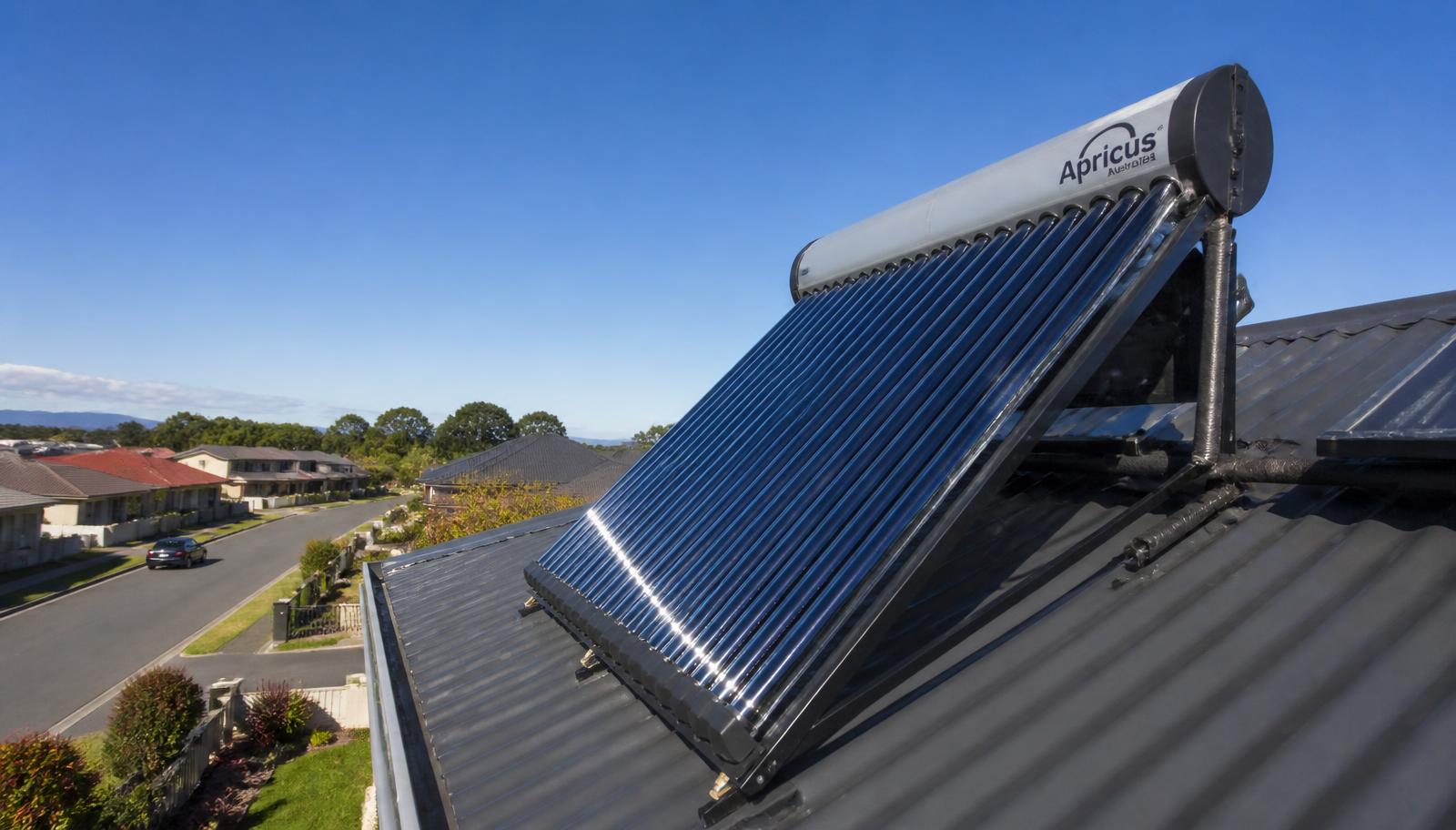 Solar hot water collectors on the roof of a Christchurch home under a clear blue Canterbury sky